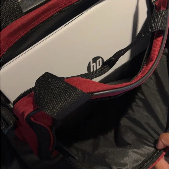 HP Silver Laptop with Black and Red Accessories